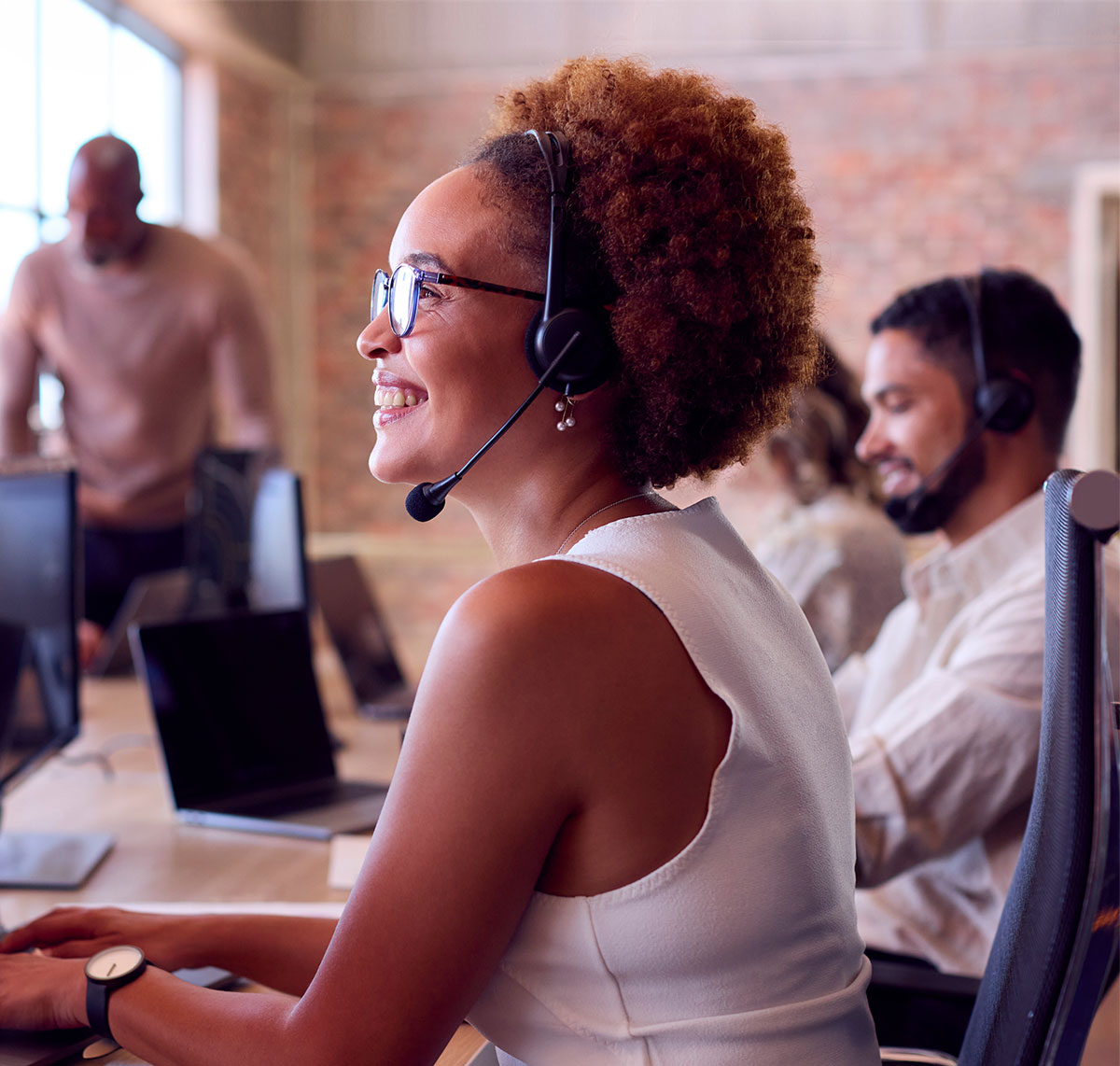 Customer support team using headset-based voice services